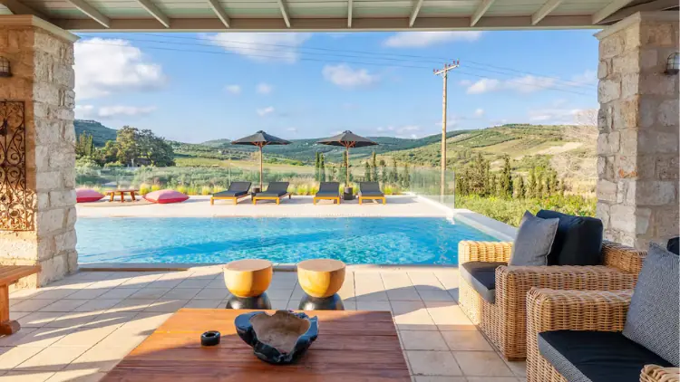 Poolside lounge area at the Greece retreat venue